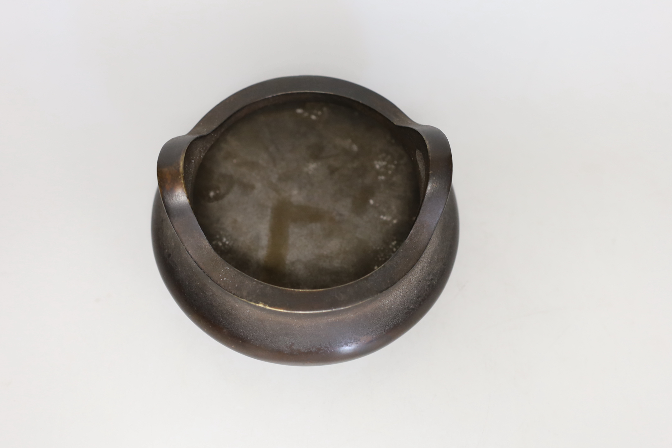 A Chinese bronze censer, ding, 8cm tall